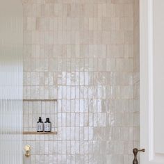 a bath room with a toilet and a sink