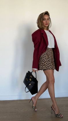 Combination Colors Clothes Outfit, Red Skort Outfit, Edgy And Classy Outfits, Chic Short Red Skirt, Leopard And Red Outfit, Leopard Outfits Aesthetic, Animal Print And Red Outfit, Red Skirt Street Style, Chic Red Mini Skirt