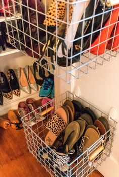 a closet filled with lots of different types of shoes