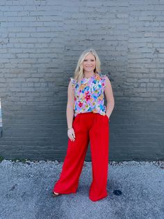 Elevate your professional wardrobe with our Straight To Business high waisted pants! The wide leg design offers a sleek and modern look, while the pockets provide practicality. The pleated detail adds a touch of sophistication. Get ready to make a bold statement in the office! Inseam 34" - From Top of Waistband to bottom hem 44" Long. Casual Red Dress Pants For Spring, Red Wide-leg Pants For Office, Red Dress Pants With Pockets For Spring, Red Straight Leg Dress Pants For Spring, Red Wide Leg Pants For Day Out, Red Wide-leg Pants For Day Out, Trendy Red Wide Leg Pants For Spring, Casual Red Dress Pants For Work, Red Wide Leg Bottoms For Business Casual