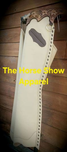 the horse show appraiel is hanging up against a wooden wall with text overlay that reads, the horse show appraiel