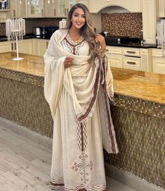 Mesmerizing Cream Habesha Dress Habesha Dress, Ethiopian Dress, Habesha Kemis, Traditional Embroidery, Religious Ceremony, Flow Design, Wedding Dress Chiffon, Red And Brown, Cultural Celebration