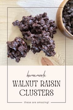 homemade walnut raisin clusters on a wooden table with a bowl of raisins