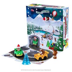 a play set with cars and people in the snow