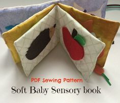 the sewing pattern for this soft baby memory book is easy to sew