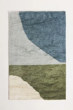 a rug with different colors and shapes on it