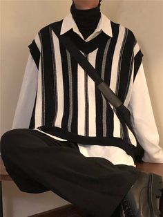 Machine wash and hang dry for optimal quality.Sizes usually run smaller than USA sizing, we recommend to size up once for correct sizing. Contact us for additional concerns. Aesthetic Black Korean, Vest Aesthetic, Knitted Sweaters For Men, Corp Goth, Vintage Waistcoat, Streetwear Ideas, Black Korean, Black Waistcoat, Fancy Clothes