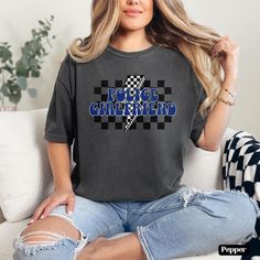 Show your support for your deputy with this stylish and trendy Police Girlfriend Shirt. Whether your loved one is a cop, first responder, or serving in law enforcement, this shirt is the perfect gift to show your appreciation and pride. Featuring a retro distressed design, this shirt is not only fashionable but also comfortable to wear all day long.  P R O D U C T *  D E T A I L S🛍️ .: The Comfort Colors 1717 tee is made with medium fabric consisting of high quality, 100% ring-spun US cotton fo Police Girlfriend, Cop Wife, Girlfriend Shirt, Girlfriend Shirts, Navy Mom, Law Enforcement Officer, Cozy Fits, Blue Line, Law Enforcement