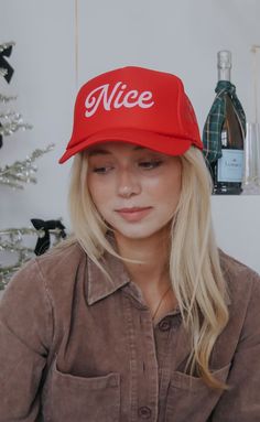 She’s a model citizen, she’s truly been an angel all year, she’s the apple of Santa’s eye, and we have just the hat for her. It’s hard work being nice, and it’s a feat that deserves recognition. Wear this embroidered hat with pride and grab the matching Naughty hat for your bestie that didn’t quite make the cut for the Nice List this year. We love them anyway :) ALL HATS ARE FINAL SALE! Trendy Trucker Hat Gift, Customizable Novelty Trucker Hat For Gift, Fun Red Trucker Hat, Christmas Trucker Hat, Fun Personalized Pink Trucker Hat, Love Them Anyway, Being Nice, Model Citizen, Nice List