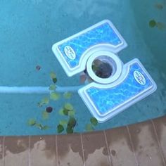 an overhead view of a swimming pool with the lid open and water falling off it