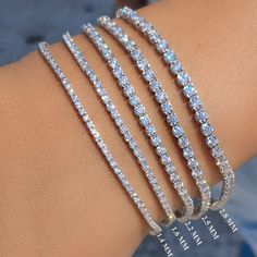 Round Moissanite Tennis Bracelet, D Color VVS Clarity, Bridal Wedding Jewelry, Thin Minimalist Stacking Bracelet Gift, 925/10K/14K/18K Gold ● 𝐃𝐢𝐚𝐦𝐨𝐧𝐝 𝐃𝐞𝐭𝐚𝐢𝐥𝐬: ➢ Diamond Type: Moissanite ( D - VVS) ➢ Diamond Shape : Round Cut 𝟏.𝟒 𝐌𝐌 𝐕𝐚𝐫𝐢𝐚𝐧𝐭 ➢ Diamond Size: 1.4 MM ➢ Carat: 1.25 CT ( 7 Inch) 𝟏.𝟔 𝐌𝐌 𝐕𝐚𝐫𝐢𝐚𝐧𝐭 ➢ Diamond Size: 2.0 MM ➢ Carat: 1.5 CT ( 7 Inch) 𝟐.𝟐 𝐌𝐌 𝐕𝐚𝐫𝐢𝐚𝐧𝐭 ➢ Diamond Size: 2.2 MM ➢ Carat: 2.68 CT ( 7 Inch) 𝟐.𝟓 𝐌𝐌 𝐕𝐚𝐫𝐢𝐚𝐧𝐭 ➢ Diamond Size: 2.5 MM ➢ Carat: 3.3 CT ( 7 Inch) 𝟐.𝟖 𝐌𝐌 𝐕𝐚𝐫𝐢𝐚𝐧𝐭 ➢ Diamond Size: 3.0 MM ➢ Carat: 4.32 CT ( 7 Inch) ● 𝐂𝐞𝐫𝐭𝐢𝐟𝐢𝐜𝐚𝐭𝐢𝐨𝐧 We do provide Jewelry Certificate on request. It is chargeable Service. Please contact us via massage for more information. ● 𝐂𝐚𝐧𝐜𝐞𝐥𝐥𝐚𝐭𝐢𝐨𝐧, 𝐑 Tennis Bracelet Stack, Vvs Diamond, Bracelet Christmas, Jewelry Dainty, Wedding Jewelry Bracelets, Wedding Bridal Jewellery, Bridal Bracelet, Round Moissanite, Wedding Bracelet