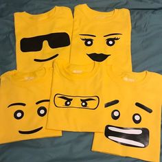 three yellow tshirts with faces drawn on them