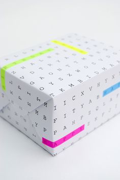 a white box with colorful writing on it