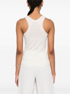 Stay cozy and stylish in this cream white cashmere tank top. The fine knit construction and ribbed trim add a touch of luxury to your everyday look, while the sleeveless design keeps you cool and comfortable all day long. Knitted cashmere for ultimate softness and warmth Scoop neck and straight hem for a flattering fit Versatile and perfect for layering or wearing on its own | Max Mara Women's Cashmere Tank Top in White | Size Medium | 11361191600 Womens Cashmere, Louis Vuitton Shoulder Bag, Short Leggings, By Max, Knitwear Cardigan, White Tank Top, Max Mara, Cream White, Top Tee