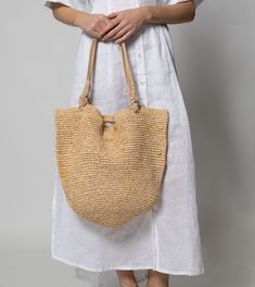 Graciela Raffia Shoulder Bag | Deep Natural Totes Cleobella Eco-friendly Hobo Bag With Leather Handles, Chic Natural Straw Bag With Round Handle, Chic Jute Straw Bag With Round Handle, Chic Handwoven Jute Bag, Chic Natural Crochet Bag With Round Handle, Everyday Bohemian Jute Bucket Bag, Chic Jute Crochet Bag With Leather Handles, Bohemian Straw Bag With Braided Handles For Everyday, Versatile Everyday Beach Bag In Natural Color