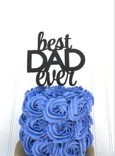 a blue cake with the words best dad ever on top