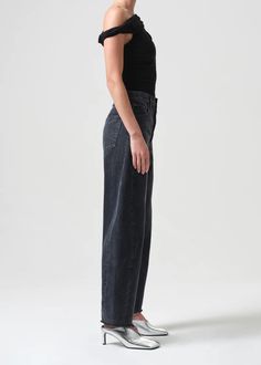 Designed by Agolde. Structured to perfection. The Luna is designed with a waist-accentuating high-rise and a full-length relaxed leg. The pieced insert detailing at the outseam creates a bowed leg silhouette, ideal for taking your everyday denim to the next level. Crafted in a signature Organic Cotton, this style will soften with each wear while keeping its vintage appeal. Fit: Model is 5'10" and is wearing a Size 27. Rise: 13". Inseam: 30 1/2". Leg Opening: 17". Materials + Care: 100% cotton. m Product Development, Mother Denim, Black Bodysuit, Scandinavian Style, Latest Fashion Clothes, Stretch Cotton, Criss Cross, Style Guides, Style Icons