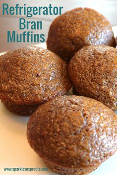 three muffins sitting on top of a white plate with the words refrigerator bran muffins