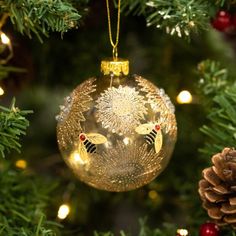 an ornament hanging from a christmas tree