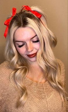 Woman with ribbons in hair Cute Simple Thanksgiving Hairstyles, Holiday Headband Hairstyles, Crismas Hairstyles, Christmas Photos Hairstyles, Christmas Hair For Women, Christmas Hair With Ribbon, Fun Holiday Hairstyles, Elegant Christmas Hairstyles, Christmas Themed Hairstyles