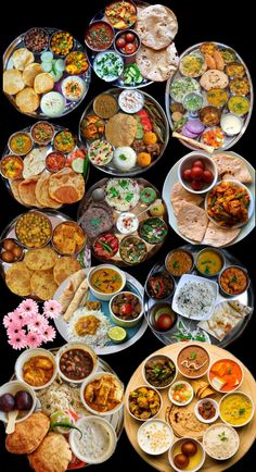 an array of different types of food are arranged in the shape of a pyramid on a black background