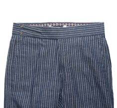 A must-have style in every man’s wardrobe, you will never look boring again with these striped trousers in blue and white. Elegantly made with high quality craftsmanship in a straight fit, flat-front style from premium quality cotton, these trousers feature a button and zip closure with a wide waistband with two extended fastening tabs. This pair of men's pants is perfect for work and everyday wear, business meetings, parties, gala dinners or summer weddings. Buy it for yourself, or gift it to a Blue Relaxed Fit Pants With Vertical Stripes, Fitted Cotton Bottoms With Contrast Stripes, Fitted Blue Bottoms With Vertical Stripes, Blue Fitted Bottoms With Vertical Stripes, Fitted Blue Pants With Vertical Stripes, Striped Cotton Bottoms With Welt Pockets, Fitted Cotton Pants With Vertical Stripes, Fitted Striped Bottoms With Welt Pockets, Fitted Pinstripe Cotton Pants