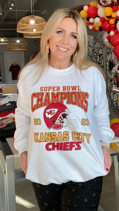 White Super Bowl Champions Sweatshirt - Our White Super Bowl Champions Sweatshirt is a white, crewneck style sweatshirt with red and golden lettering and a vintage vibe. It is the PERFECT way to show your love for our Chiefs all year long! - Pair with your favorite pants, a pair of our super popular Star Sneakers, and some of our super cute KC earrings! - Available in sizes small through 2XL Super Bowl Champions, Crewneck Style, Style Sweatshirt, White Crewneck, Childrens Dress, Champion Sweatshirt, Star Sneakers, Vintage Vibe, Vintage Vibes