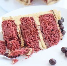 a slice of red velvet cake on a white plate