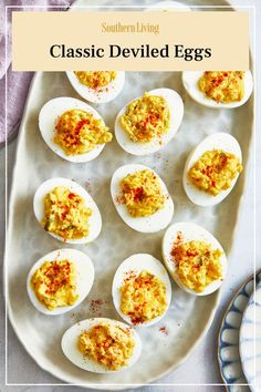 deviled eggs on a platter with the words southern living classic deviled eggs