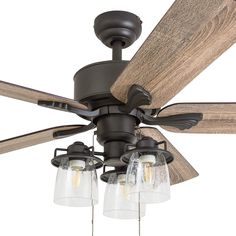 a ceiling fan with three lights and wood blades