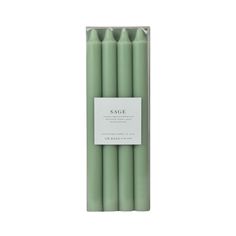 sage green candles in a package on a white background