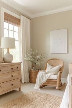 a bedroom with a rocking chair, dresser and window