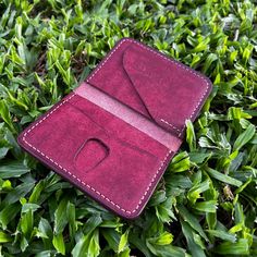 Vegetable-tanned pueblo leather wallet in a rich Bordeaux colour. This slim-lined wallet has a soft, supple, yet subtly firm texture with a rustic appearance that adds depth and character as it ages. Features: - Four card slots capable of holding 1-2 cards each - Convenient quick-access pocket (Right) - Card slot with thumb window for easier access (Left) - Handstitched with polyester thread Burgundy Wallet With Interior Card Slots, Burgundy Rectangular Wallet With Interior Card Slots, Burgundy Leather Wallet For Daily Use, Burgundy Leather Wallets For Daily Use, Burgundy Wallets With Card Slots For Daily Use, Classic Burgundy Wallets With Interior Card Slots, Burgundy Wallet With Card Slots For Daily Use, Classic Burgundy Wallet With Interior Card Slots, Classic Burgundy Wallet With Card Slots