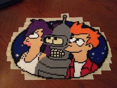 an image of two cartoon characters on a piece of sticker paper that looks like it has been made out of legos