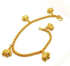 PRICES MAY VARY. Elephant Bell 24K Thai Baht Gold GP Jewelry Bracelet Charm Anklet Bell 9 inch All gold plated jewelry was sent directly to us from the manufacturer in Bangkok This Unique Jewelry Is Bronze Coated With Pure Gold Looks Just Like Solid Gold This purity (96.5%) is simply unavailable in the Western World Sourced by us in Bangkok, Thailand. Dimensions Weight 12 grams Length 9 inch Thai Gold Jewelry Designs Description All gold plated jewelry was sent directly to us from the manufactur Gold Jewelry Designs, Star Anklet, Womens Cuff Bracelets, Women Jewellery, Western World, Girl Jewelry, Classy Jewelry, Foot Jewelry, Jewelry Choker