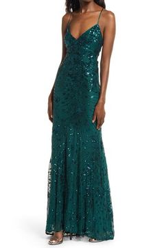 A spray of sequins lends a liquid finish to a forest-green maxi dress styled with a V-neck and slender straps. 49 1/2" to 53" length (size Medium) V-neck Sleeveless Lined 93% polyester, 7% spandex Hand wash, line dry Imported Long Hoco Dresses, High Low Maxi Dress, Green Maxi, Green Midi Dress, Maxi Dress Green, Hoco Dresses, Style Maxi Dress, Nordstrom Dresses, Sequin Dress