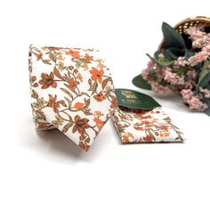 Copper Orange Floral Necktie, Terracotta Floral Neckties, Same matching, Groom necktie, Wedding tie, Mens necktie, Pocket square set ■ All our neck ties can be made in the following sizes, just specify which size you need in a note at che ADULT, 2.36" (6cm) wide at it's widest point and 61" (155cm) long - standard length and width. Hand rolled and sewn by hand. Product Representation: While we make every effort to accurately represent our products through images, please be aware that actual colo White Necktie For Gift, White Standard Tie For Gift, White Standard Tie As Gift, White Standard Tie For Suit As A Gift, Rectangular Pocket Square As A Gift, Multicolor Pocket Square With Ties As A Gift, Adjustable Standard Tie For Gift, Goblin Core Fashion, Floral Necktie