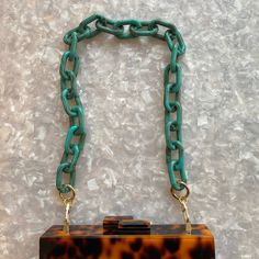 Acrylic Purse Strap in Turquoise Green Shoulder Bag With Chain Strap As Gift, Rectangular Box Bag With Adjustable Strap For Gift, Rectangular Box Bag With Adjustable Strap, Rectangular Box Bag With Adjustable Strap As Gift, Trendy Rectangular Bag Strap With Detachable Feature, Green Rectangular Box Bag With Adjustable Strap, Square Box Bag With Adjustable Strap As Gift, Trendy Box Bag With Detachable Strap As Gift, Trendy Rectangular Turquoise Shoulder Bag