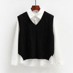 Channel some serious preppy princess vibes with the Rossana Cable-knit Vest. Featuring a wool blended knit material all over, a cropped length silhouette, a ribbed detail at the edge, and a pull-on style. 100% Polyester Pull-on style Imported Cable Knit Vest, Outwear Fashion, Sleeveless Jumper, Stylish Coat, Vest Women, Sweater Vest Women, Black Vest, Loose Sweater, Knit Vest