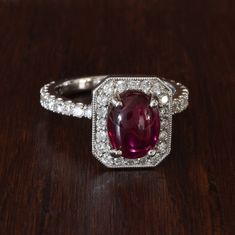 CABOCHON RUBY & DIAMONDS HAND CRAFTED RING CENTER STONE: Cabochon Oval Ruby Stone Measurements: 8.9 X 6.9mm SIDE STONES: Diamonds Diamond Quality: VS2 Total Diamond Weight:  1.8 Carats Stone Count: 62 Diamond Diameter: 1.9 METAL: 14K White Gold Weight: 4.3g Ring Size: 5 1/2 (Adjustable) It's available in other metals and stones. Custom designs hand crafted. Please if you have any questions contact me I'm very happy to solve your question. I offer flexible payment options the rest of the payment Oval Ruby Ring, Cabochon Ruby, Ankle Chain, Red Band, Ruby Stone, Tourmaline Ring, Ring Oval, Ruby Diamond, Ruby Ring