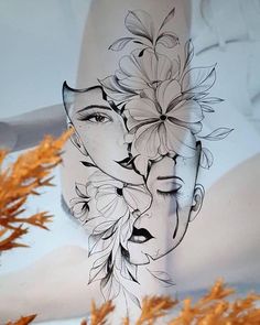 a woman's face with flowers in her hair