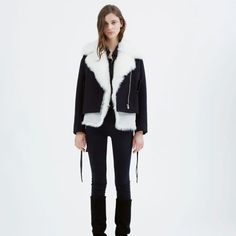 Never Worn, W/O Tags. 2-Piece Coat: Black Jacket W/ Black Lamb Shearling (Photos Of White Shearling And Navy Coat Combination Only For Clearer Representation). Fits Large On Me So Never Wore It. Removable Sleeveless Shearling Vest Gives This Classic Jacket A Luxurious Update. Wear Separately Or Layer For A Chic Style. Front Zip Closure. Sleeves With Lace-Up Cuffs. Two Snap-Flap Front Pockets. Concealed Hook-And-Eye Closure On Vest. Fabric: 52%Cotton/39%Wool/9% Polyamide Lining: 51%Cotton/49%Visc Chic Shearling Leather Jacket For Work, Chic Biker Jacket With Faux Fur Trim For Work, Chic Biker Jacket With Faux Fur Trim, Fitted Shearling Outerwear For Work, Navy Coat, Shearling Vest, Navy Jacket, Classic Jacket, Black On Black