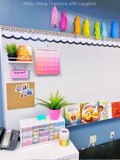 there is a desk with many books on it