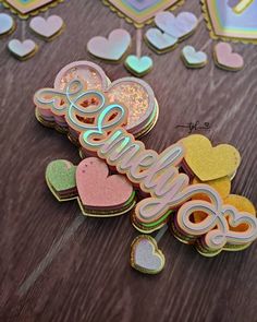 some heart shaped cookies sitting on top of a table