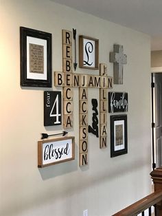 the wall is decorated with many different types of scrabbles and letters on it