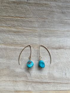 Simple and sleek, these simple Turquoise dangles are a classic!  -Handmade with love  -Genuine Turquoise Beads  -Gold Filled materials  -Approximately 1.5 inch long Please note: each batch of turquoise beads varies in color and veining. Minimalist Turquoise Teardrop Earrings, Minimalist Turquoise Earrings For Everyday, Minimalist Turquoise Earrings For Everyday Wear, Adjustable Turquoise Teardrop Earrings, Turquoise Dangle Jewelry For Everyday, Everyday Turquoise Dangle Jewelry, Minimalist Adjustable Hypoallergenic Teardrop Earrings, Dainty Turquoise Earrings For Everyday, Minimalist Hypoallergenic Turquoise Earrings