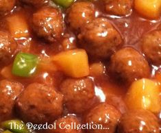 meatballs and vegetables are being cooked together in a sauce that is very good to eat