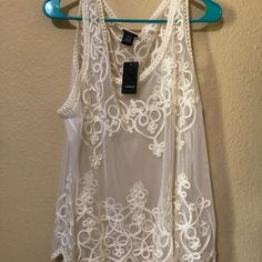 Questions? Leave A Comment Below! White Lace Top With Intricate Embroidery, White Lace Tops With Intricate Embroidery, Layered Tank Top, Hot Pink Floral, Blouse Tank Top, Floral Peplum, Floral Fit, Tunic Tank Tops, Sleeveless Tunic