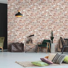 a living room with brick walls and furniture