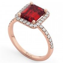 a ring with a red stone surrounded by white and brown diamonds on the sides, set in 18k rose gold